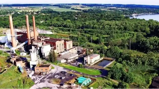 A vast mining farm powered by solar panels, representing the future of sustainable cryptocurrency mining.