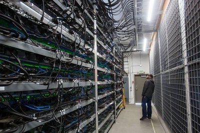 Wind turbines powering a cryptocurrency mining farm in Texas